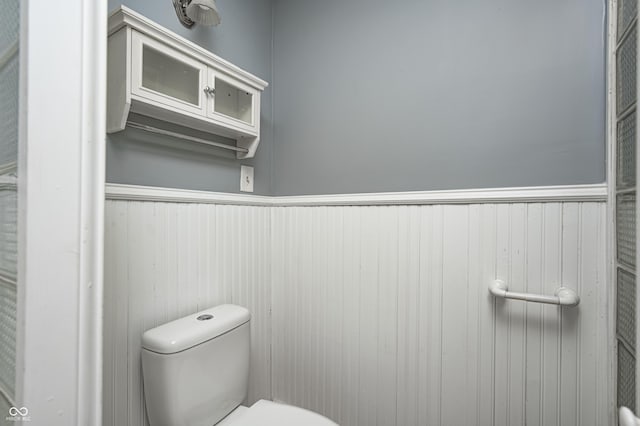 832 Noble St, Indianapolis, IN 46203 - bathroom with toilet and wainscoting