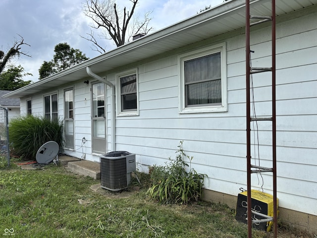 17420 S 60 E, Columbus, IN 47201 - view of side of property featuring a central air condition unit