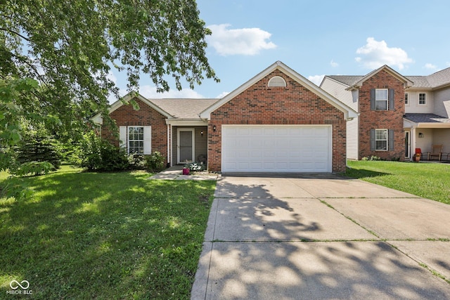 6117 Salanie Pl, Indianapolis, IN 46254 - view of front of home with a garage, concrete driveway, a front yard, and brick siding