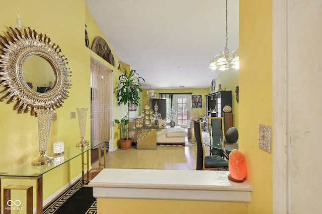 6117 Salanie Pl, Indianapolis, IN 46254 - hall with wood finished floors and a chandelier