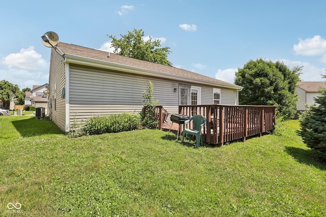 6117 Salanie Pl, Indianapolis, IN 46254 - back of house with a wooden deck and a yard
