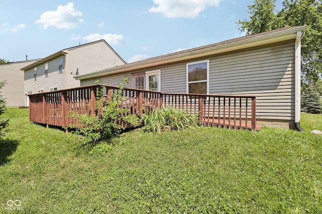 6117 Salanie Pl, Indianapolis, IN 46254 - back of property featuring a deck and a lawn