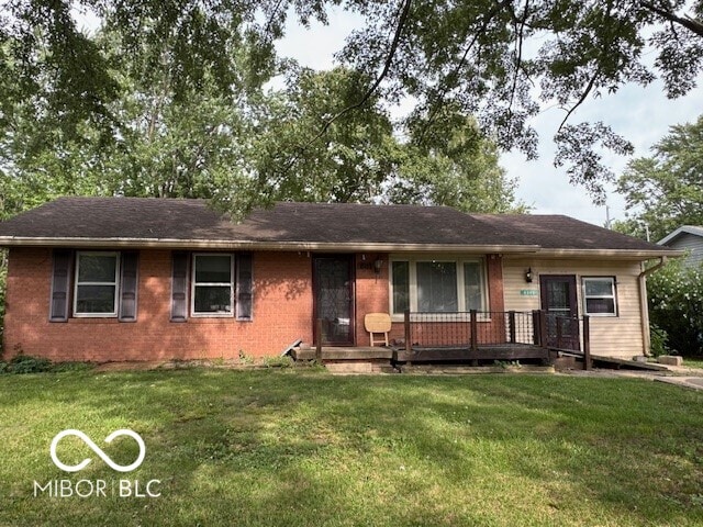 4845 Timbercrest Dr, Columbus, IN 47203 - ranch-style house with a front lawn and brick siding