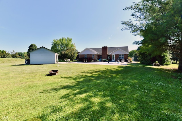 114 Sunrise Ln, Lizton, IN 46149 - view of grassy yard with a patio area