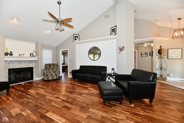 114 Sunrise Ln, Lizton, IN 46149 - living room with a fireplace, high vaulted ceiling, a ceiling fan, and wood finished floors