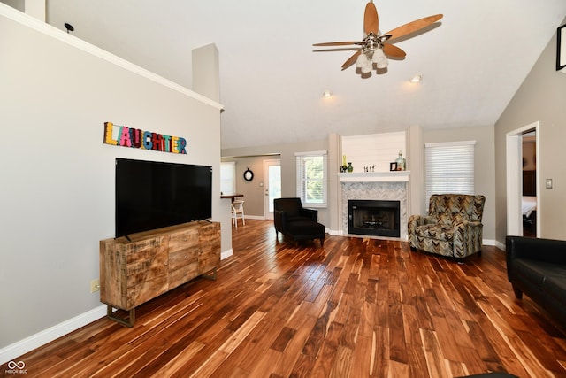 114 Sunrise Ln, Lizton, IN 46149 - living area with vaulted ceiling, wood finished floors, ceiling fan, and a fireplace