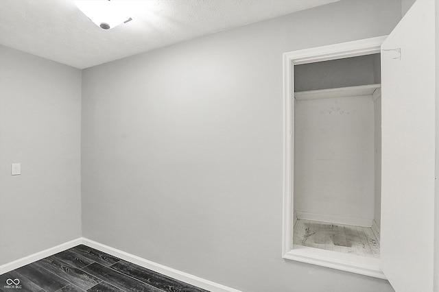 3664 S 550 E, Franklin, IN 46131 - interior space with dark wood-style flooring and a textured ceiling