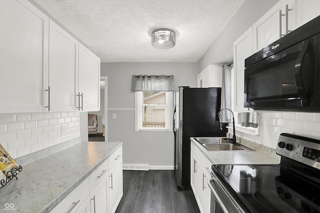 3664 S 550 E, Franklin, IN 46131 - kitchen featuring electric stove, black microwave, dark wood-style flooring, white cabinets, and decorative backsplash