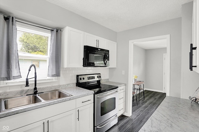 3664 S 550 E, Franklin, IN 46131 - kitchen featuring electric range, black microwave, white cabinetry, backsplash, and dark wood-type flooring
