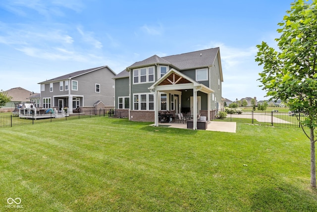 16338 Portage Trail Ln, Fortville, IN 46040 - back of property with a patio area and a fenced backyard