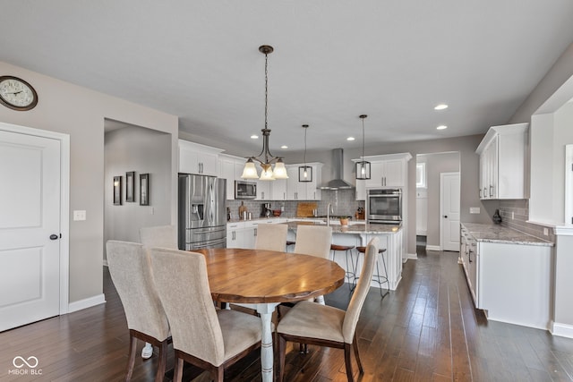16338 Portage Trail Ln, Fortville, IN 46040 - dining room with recessed lighting, dark wood-style flooring, and a chandelier