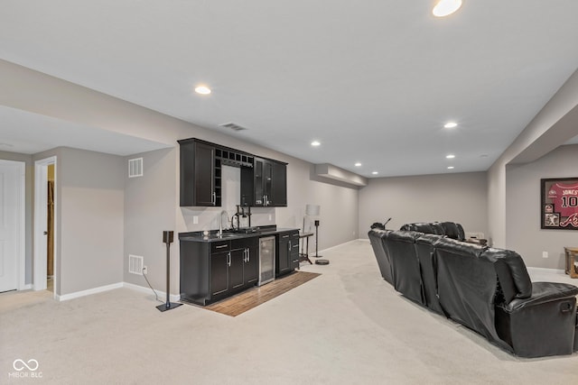 16338 Portage Trail Ln, Fortville, IN 46040 - home theater with wine cooler, wet bar, light colored carpet, and recessed lighting