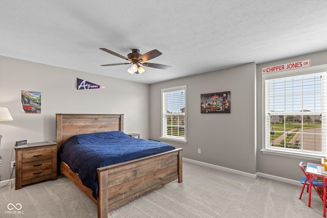 16338 Portage Trail Ln, Fortville, IN 46040 - bedroom featuring light colored carpet, ceiling fan, and a textured ceiling