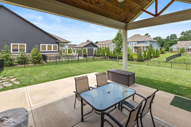 16338 Portage Trail Ln, Fortville, IN 46040 - fenced backyard with a patio area, a residential view, outdoor dining space, and a ceiling fan