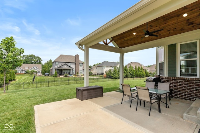 16338 Portage Trail Ln, Fortville, IN 46040 - fenced backyard featuring a residential view, a ceiling fan, a patio, and outdoor dining area