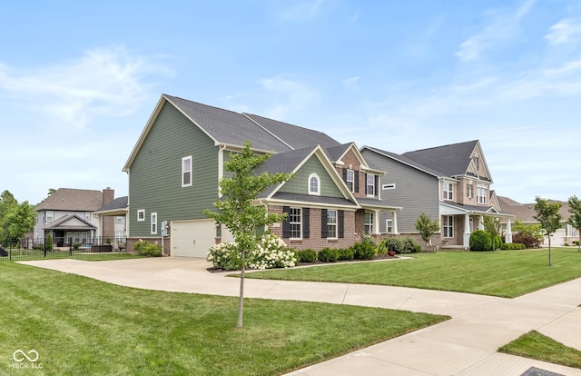16338 Portage Trail Ln, Fortville, IN 46040 - view of front facade featuring an attached garage, brick siding, concrete driveway, and a residential view