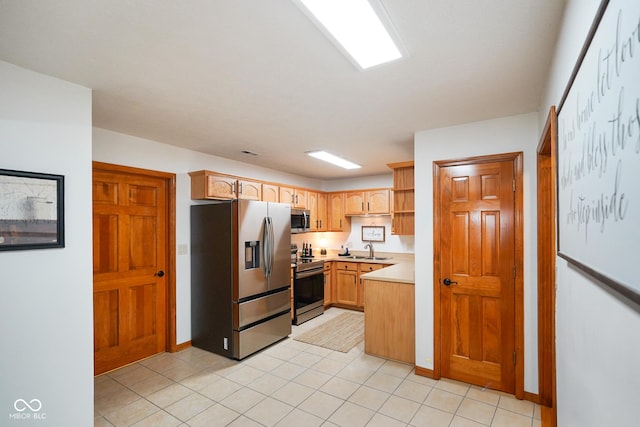 4001 Oakfield Dr, Indianapolis, IN 46237 - kitchen featuring stainless steel appliances, light countertops, open shelves, and light tile patterned flooring