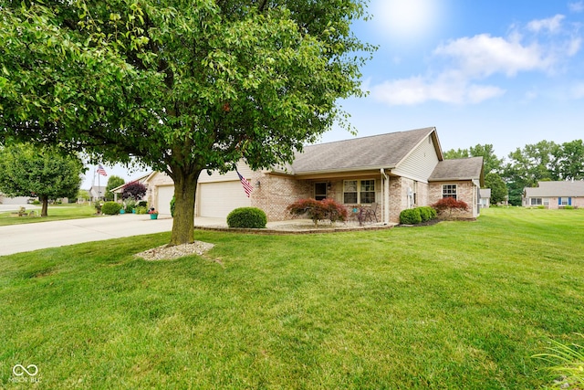4001 Oakfield Dr, Indianapolis, IN 46237 - view of front of property with driveway, brick siding, a front yard, a shingled roof, and a garage