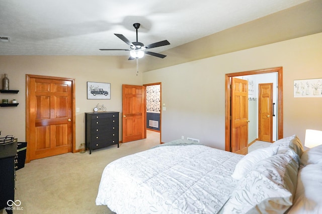 4001 Oakfield Dr, Indianapolis, IN 46237 - bedroom featuring vaulted ceiling, light carpet, and a ceiling fan