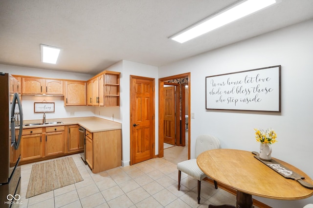 4001 Oakfield Dr, Indianapolis, IN 46237 - kitchen with appliances with stainless steel finishes, open shelves, light countertops, and light tile patterned floors