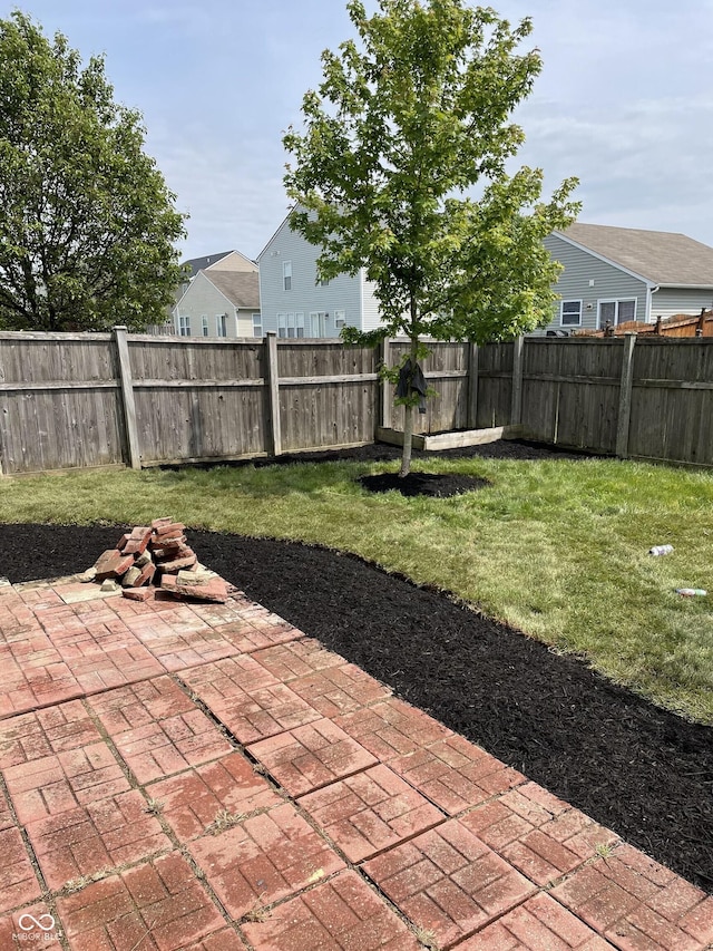 9701 W Constellation Dr, Pendleton, IN 46064 - fenced backyard with a patio area