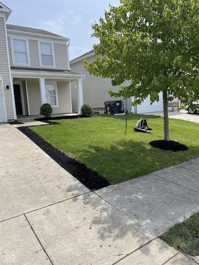 9701 W Constellation Dr, Pendleton, IN 46064 - view of front facade with a front lawn and a porch