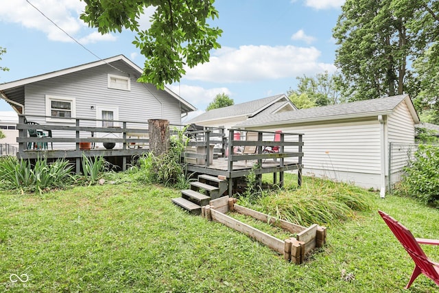 2933 S E St, Indianapolis, IN 46225 - view of green lawn featuring a wooden deck