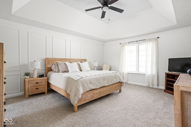 2025 W Morse Dr, Cicero, IN 46034 - bedroom with a raised ceiling, light carpet, and a ceiling fan