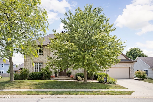 2025 W Morse Dr, Cicero, IN 46034 - view of front facade featuring brick siding, concrete driveway, an attached garage, and a front yard