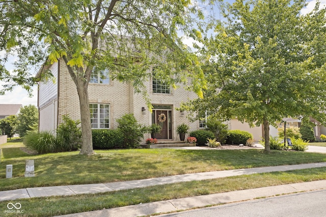 2025 W Morse Dr, Cicero, IN 46034 - colonial-style house with brick siding and a front yard