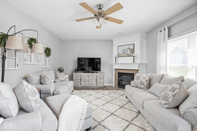 2025 W Morse Dr, Cicero, IN 46034 - living room with a ceiling fan, healthy amount of natural light, light wood-style flooring, and a tile fireplace