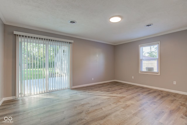 1453 Churchill Rd, Franklin, IN 46131 - spare room with ornamental molding, wood finished floors, and a textured ceiling