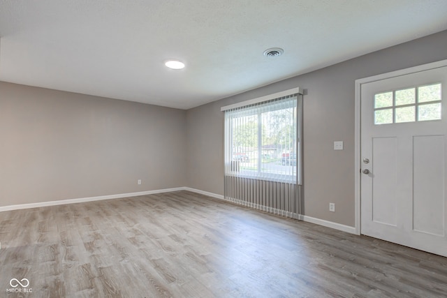 1453 Churchill Rd, Franklin, IN 46131 - entryway with wood finished floors and baseboards