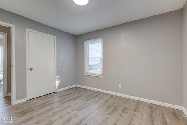 1453 Churchill Rd, Franklin, IN 46131 - spare room with light wood-style floors and baseboards