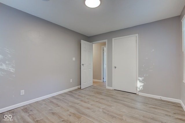 1453 Churchill Rd, Franklin, IN 46131 - unfurnished bedroom with light wood-style floors and baseboards