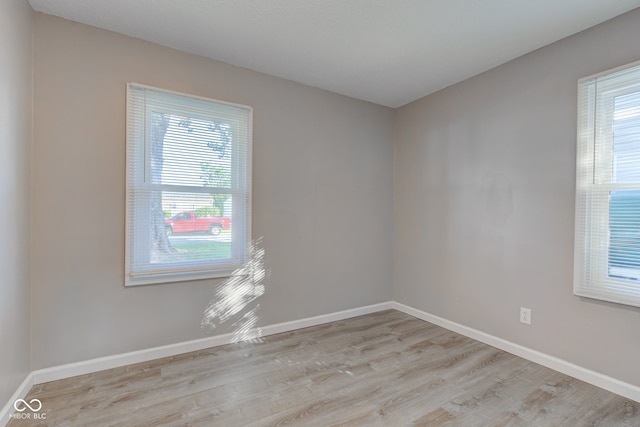 1453 Churchill Rd, Franklin, IN 46131 - empty room with wood finished floors and plenty of natural light