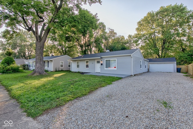 1453 Churchill Rd, Franklin, IN 46131 - single story home featuring an outbuilding, a chimney, view of wooded area, and a garage