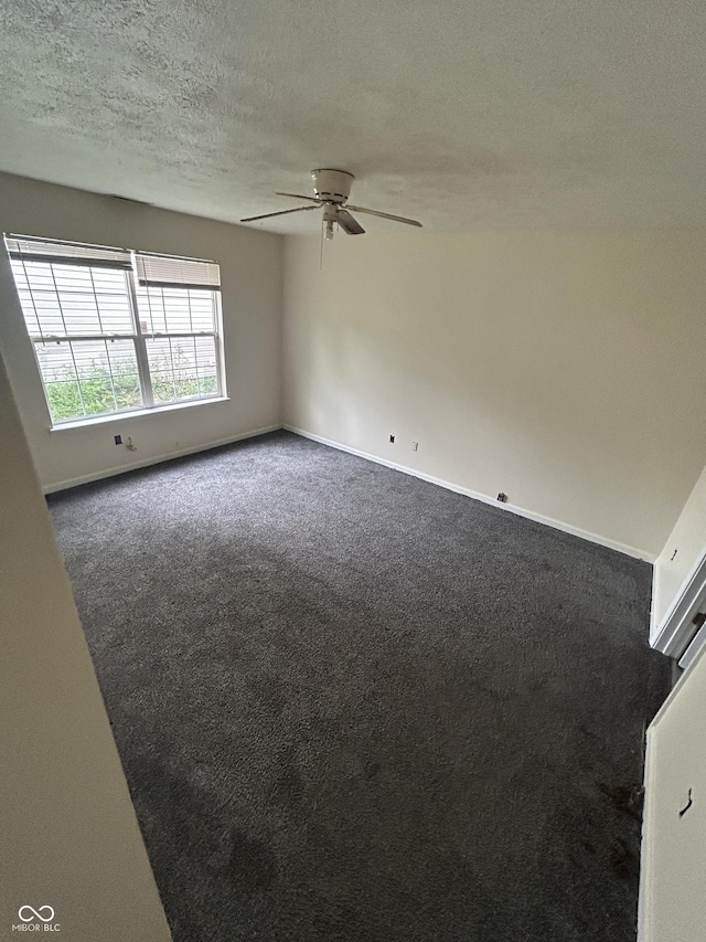 10662 Lostpine Ln, Indianapolis, IN 46235 - carpeted empty room with a ceiling fan and a textured ceiling