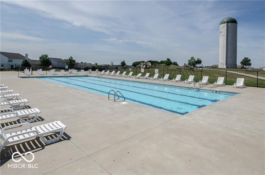3371 Firethorn Dr, Whitestown, IN 46075 - community pool with a patio area