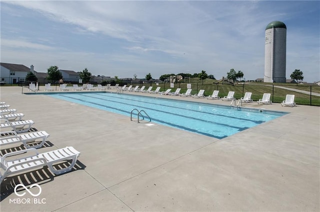3371 Firethorn Dr, Whitestown, IN 46075 - community pool with a patio area