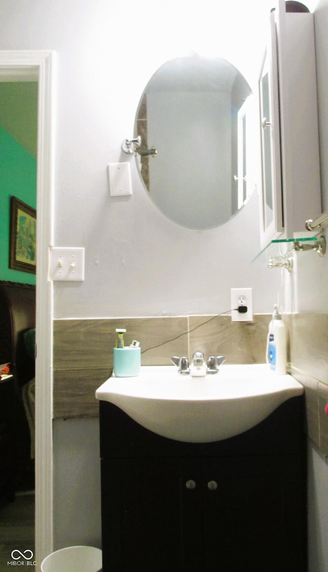 6808 Summer Time Dr, Indianapolis, IN 46226 - bathroom featuring vanity and tile walls