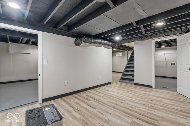 3369 N Chester Ave, Indianapolis, IN 46218 - finished basement featuring wood finished floors and stairs