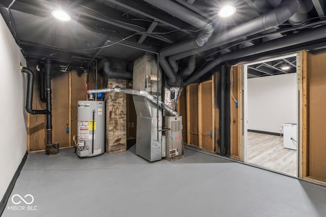 3369 N Chester Ave, Indianapolis, IN 46218 - unfinished below grade area with gas water heater and heating unit