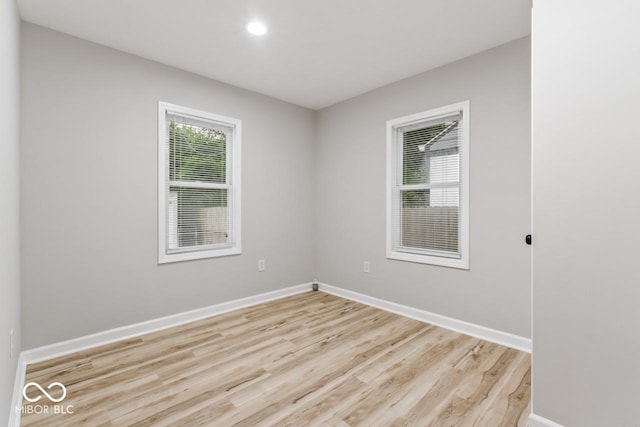 3369 N Chester Ave, Indianapolis, IN 46218 - empty room featuring light wood-type flooring and recessed lighting