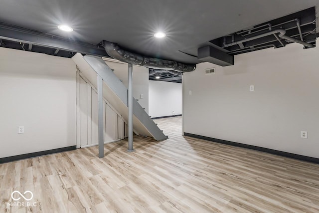 3369 N Chester Ave, Indianapolis, IN 46218 - finished basement with wood finished floors and recessed lighting
