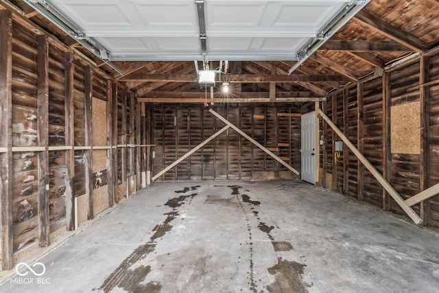 3369 N Chester Ave, Indianapolis, IN 46218 - garage featuring a garage door opener