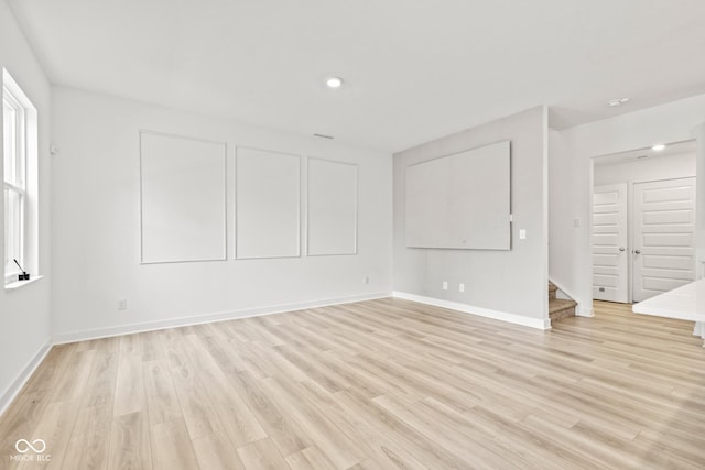 7239 Governors Row, Avon, IN 46123 - empty room with stairway, light wood-style flooring, and recessed lighting
