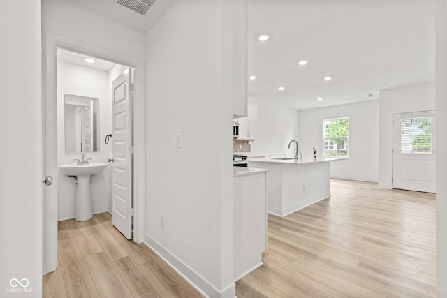 7239 Governors Row, Avon, IN 46123 - hall featuring light wood-type flooring and recessed lighting