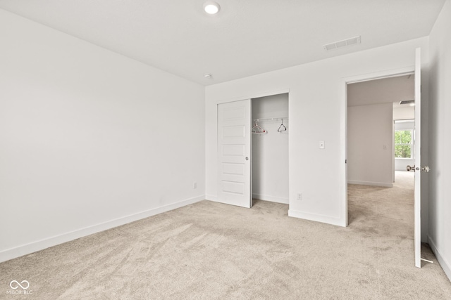 7239 Governors Row, Avon, IN 46123 - unfurnished bedroom featuring light carpet and a closet