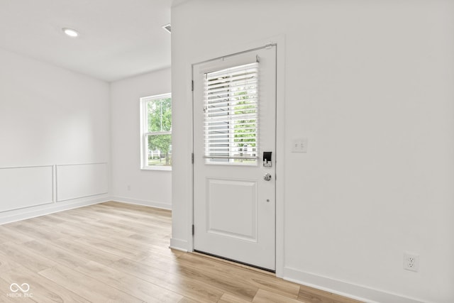 7239 Governors Row, Avon, IN 46123 - foyer entrance with light wood-style floors and baseboards
